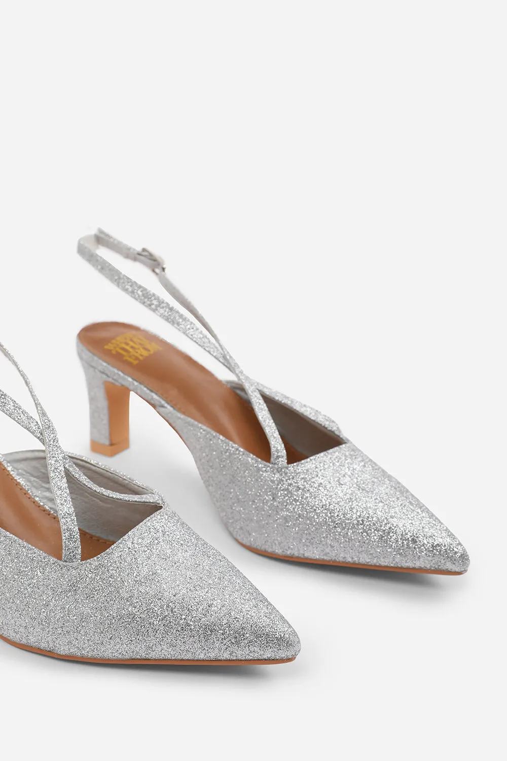 SERNA WIDE FIT POINTED TOE LOW BLOCK HEEL WITH CROSS OVER ANKLE STRAP IN SILVER FINE GLITTER